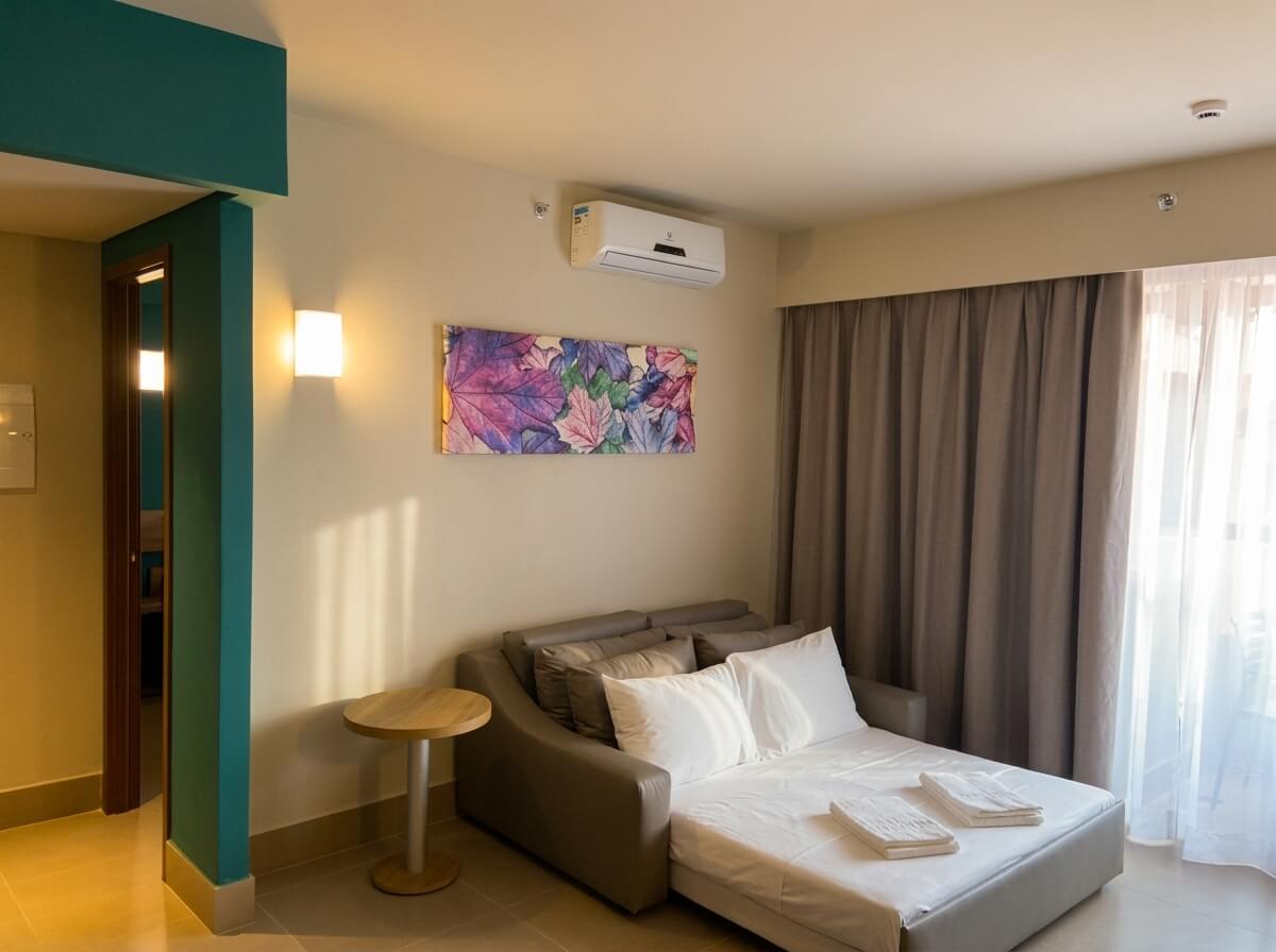 Sala da Suíte Luxo com sofá-cama