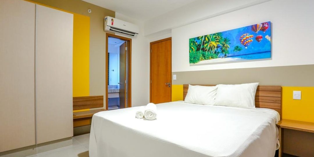 Suíte com cama de casal no Enjoy Olímpia Park Resort