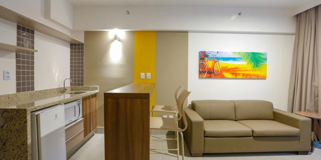 Sala de estar da suíte no Enjoy Olímpia Park Resort